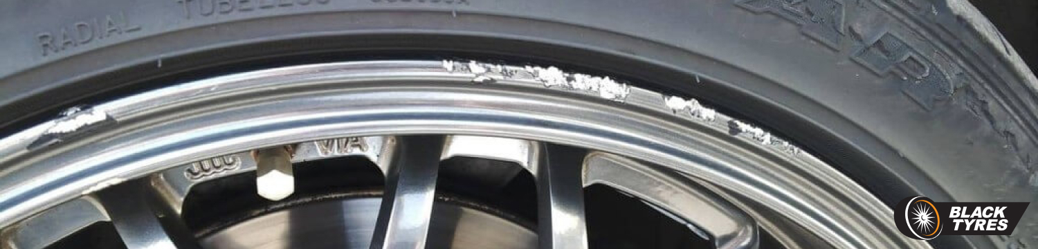 Автомобильные литые диски со следами бордюрки